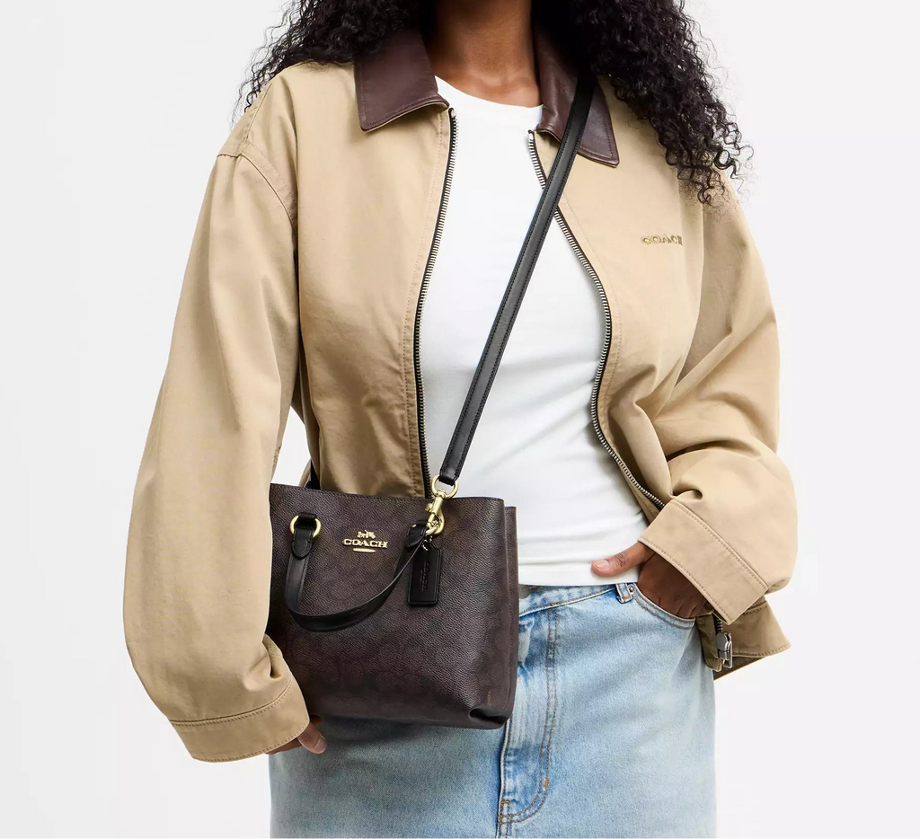 Station Carryall Bag In Signature Canvas Walnut Black Coach