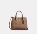 Station Carryall Bag In Signature Canvas Tan Coach