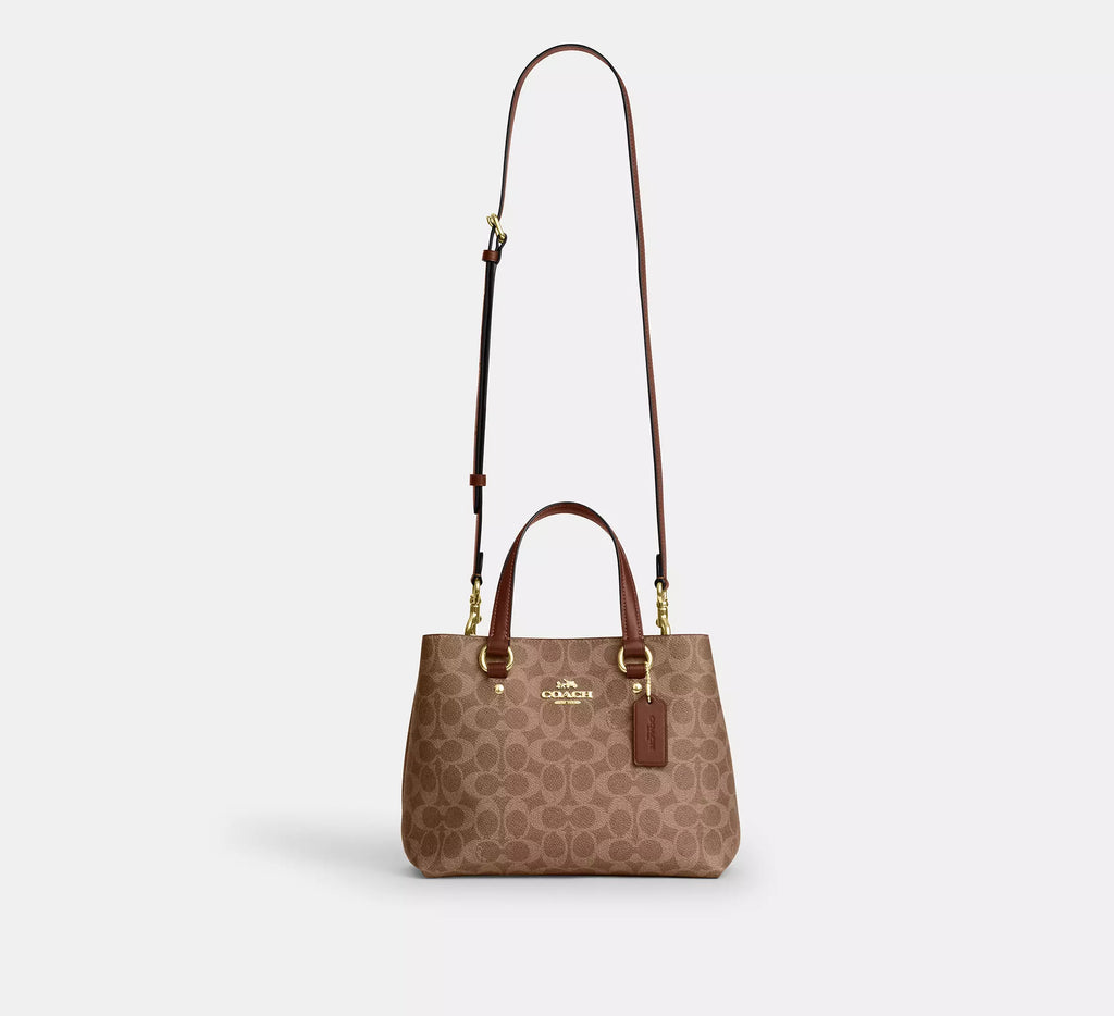 Station Carryall Bag In Signature Canvas Tan Coach