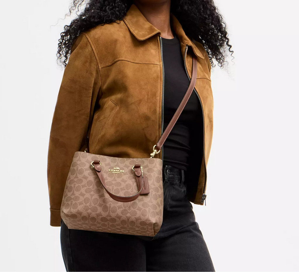 Station Carryall Bag In Signature Canvas Tan Coach