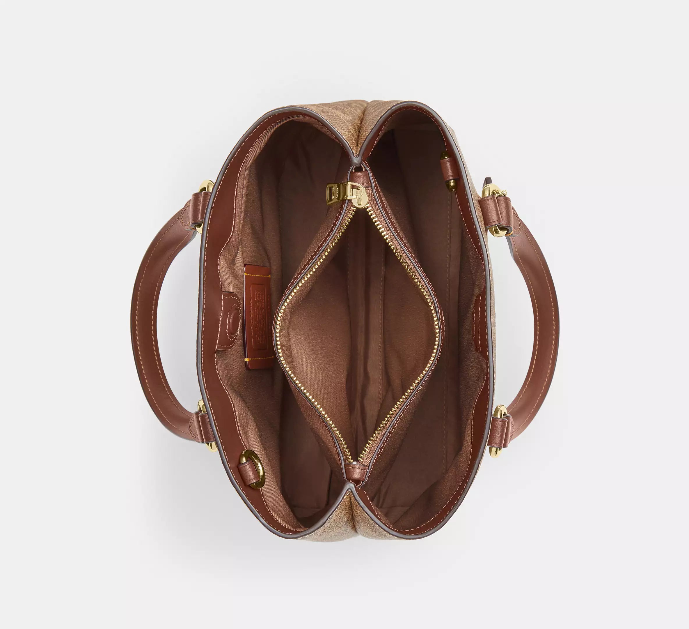 Station Carryall Bag In Signature Canvas Tan Coach