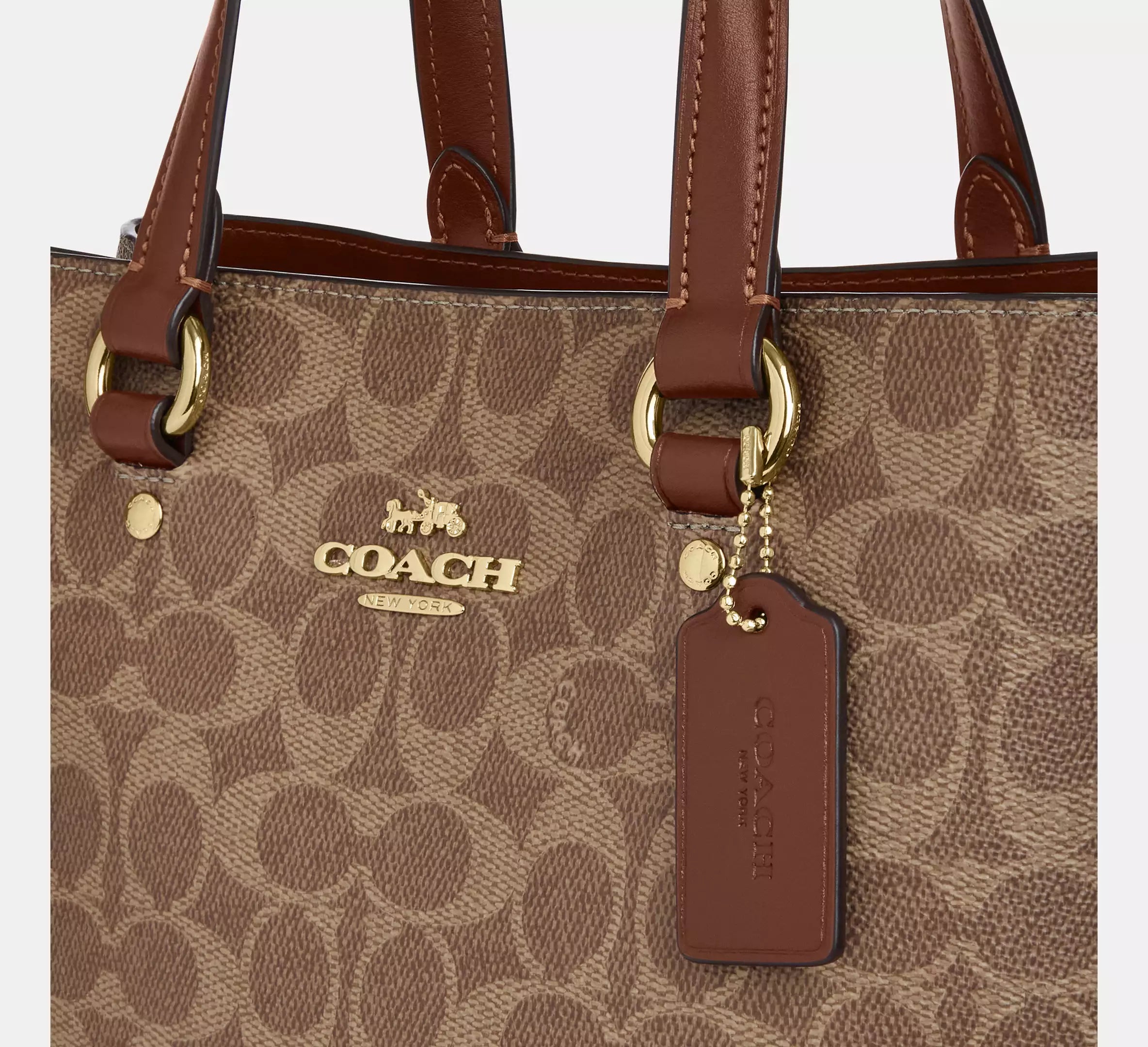 Station Carryall Bag In Signature Canvas Tan Coach